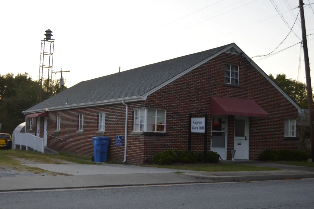 Front and southern side of the Capron town hall, located on Main Street north of the railroad line in Capron, Virginia, United States.