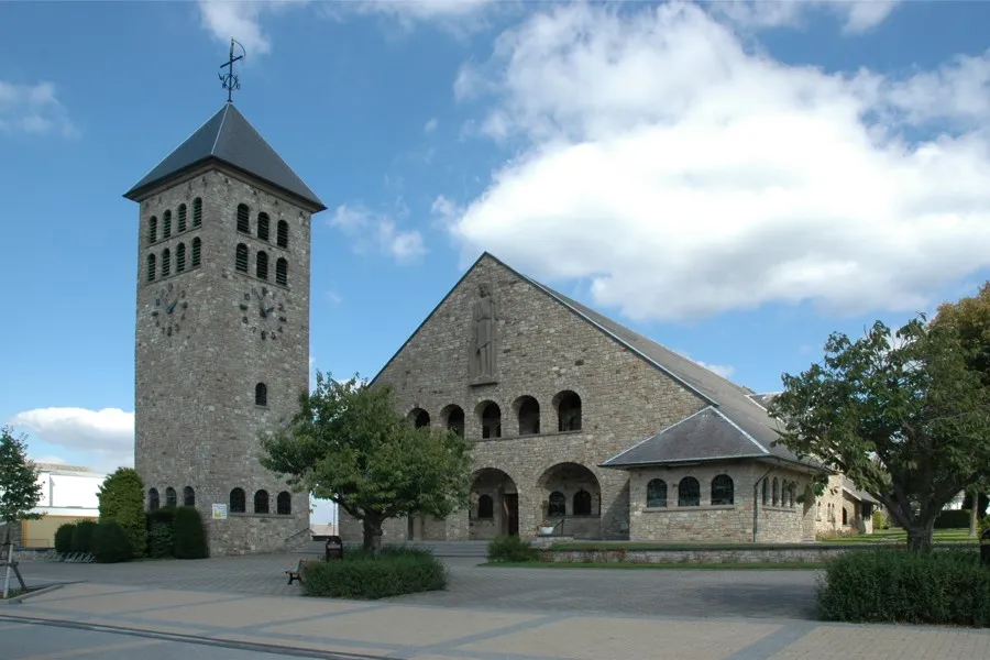 The church “St. John the Baptist” in Rocherath-Krinkelt, a village of Büllingen, Belgium. It was built in 1953/54 in the style of Romanesque Revival to replace its predecessor, which was destroyed in World War II.