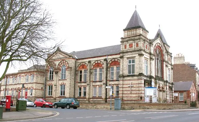 Southlands Methodist Church A large building in a flamboyant style using white and red brick with terracotta panels, and dating from 1887. I will leave it to the viewer to decide if this is an attractive building or not.