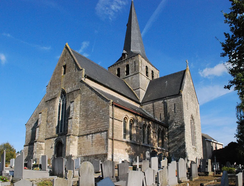 Southeast view of the church of Saint Walburga and part of the surrounding graveyard at the village of Meldert, commune of Aalst, Belgium. Nikon D60 f=18mm f/16 ISO 1600 1/1000s. Perspective &amp; framing corrected using GIMP 2.6.11.