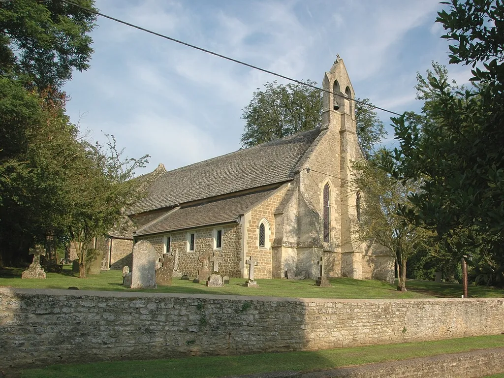 St Thomas of Canterbury parish church, Elsfield, Oxfordshire: view from the northwest showing 13th century west lancets, buttress and bellcote and 19th century north aisle