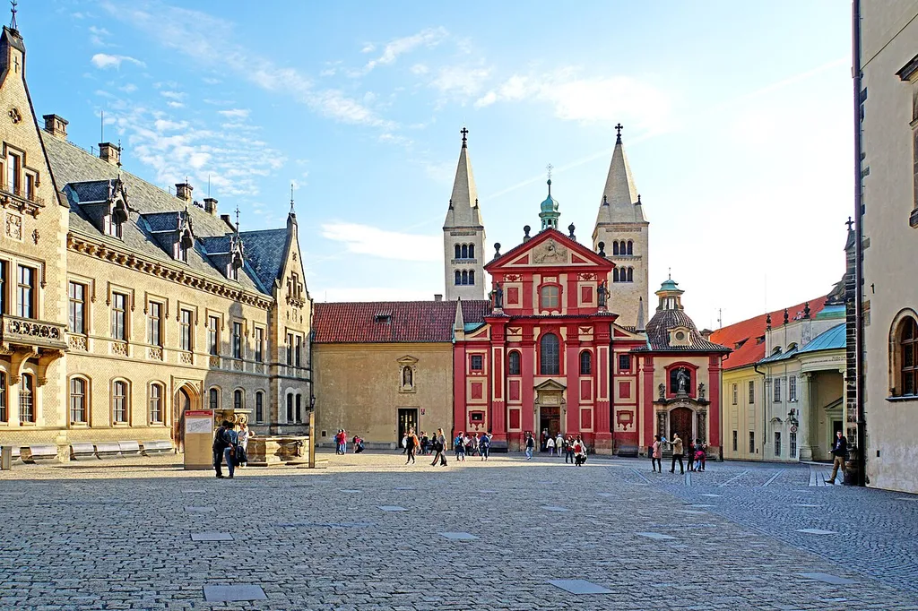 St. George's Basilica is the oldest church in Prague Castle. It was founded by Prince Vratislav (915-921) in 920. The basilica was then enlarged in 973 with the construction of St. George's Benedictine Convent. In 1142 St. George's Basilica had to be rebuilt following a fire. The Baroque facade that we see today was added in 1671-1691. Inside the church are several tombs of major historic importance. There is the tomb of St. Ludmila, the saint and widow of the 9th century ruler Prince Borivoj. Also buried in the basilica are Prince Vratislav and Boleslav II.