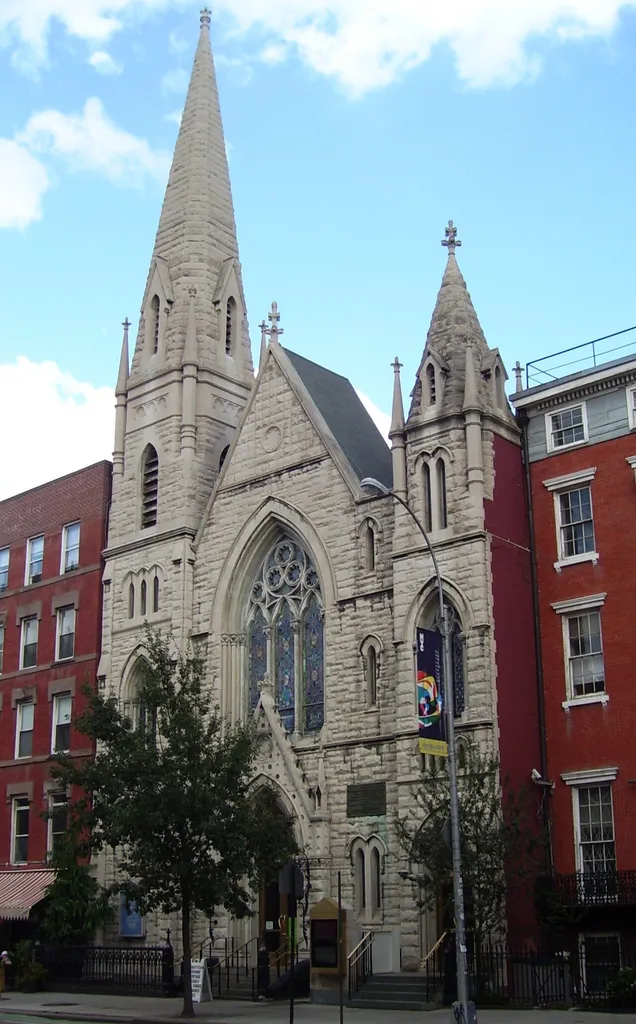The Middle Collegiate Church on Second Avenue between 6th and 7th Streets in the East Village, Manhattan, New York City, a Gothic Revival Dutch Reformed church, built in 1891-92 and designed by Samuel B. Reed. The stained glass windows are by Louis Comfort Tiffany. It is located within the East Village/Lower East Side Historic District (Sources: "East Village/Lower East Side Historic District Designation Report" and AIA Guide to NYC(4th ed.)}