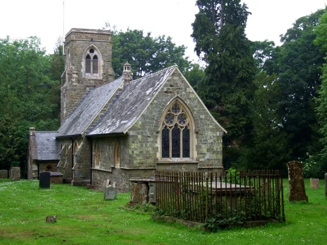 St Mary, Harrington The church of St Mary was almost completely rebuilt in 1854-5, of Somersby sandstone and Ancaster stone. With public subscription and at his own expense, the Reverend Robert Wentworth Cracroft commissioned S S Teulon, the architect, to replace the former church at a cost of £1,000. There is an effigy of a recumbent knight near the pulpit. The font dates from the 15th-century and this, together with an ancient poppy-headed bench in the chancel, also date from an earlier building. There are monuments to the Copeldikes/Amcotts (the last Copeldike being of 1658.) and a brass of c1480. The original tower arch supports 3 bells and a ting tang (a small ceiling bell) dated 1814. The Parish register dates from 1697. The church seats about 200. In just over 100 years the population of Harrington has dwindled from 123 to about 40.