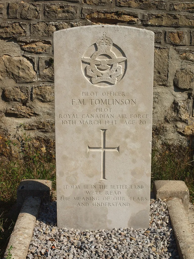 CWGC headstone in Élan, Ardennes for Pilot Officer Frank Tomlinson, RCAF.He served in 7 Squadron RAF, and died on 10 March 1943, aged 20.