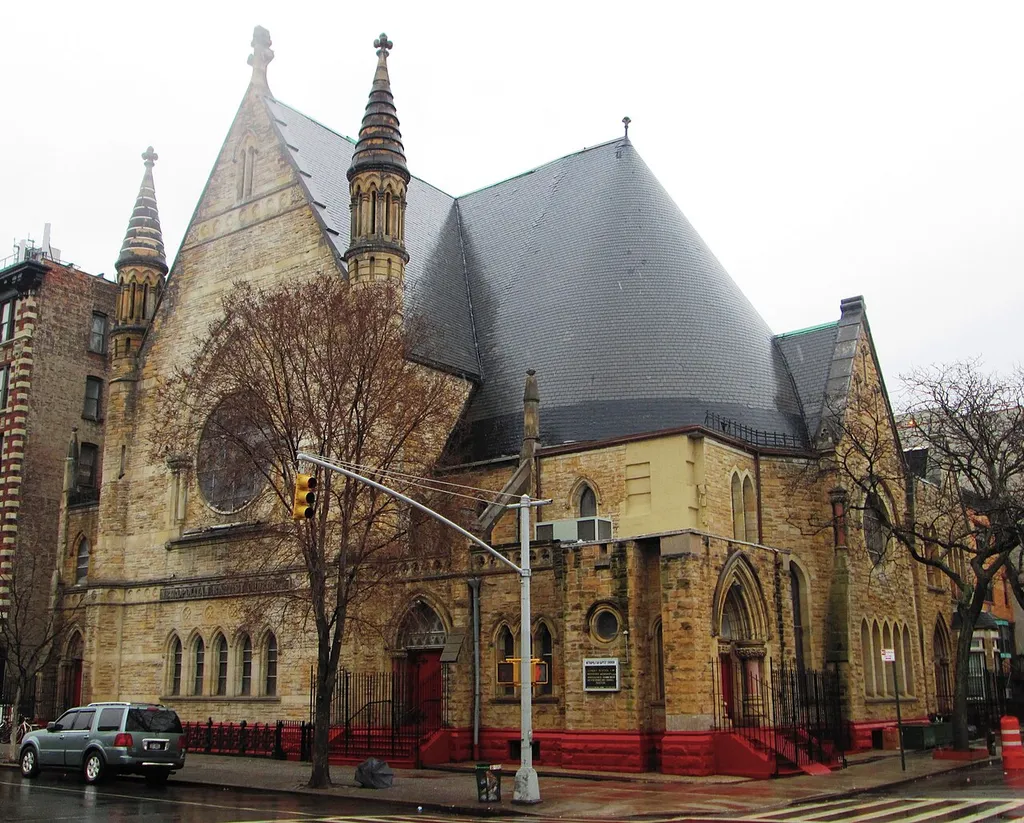 The Metropolitan Baptist Church, located at 151 West 128th Street between Adam Clayton Powell Jr. Boulevard and Lenox Avenue in the Harlem neighborhood of Manhattan, New York City, was originally built in two sections for the New York Presbyterian Church. The chapel and lecture room were built in 1884-85 and were designed by John R. Thomas, while the main sanctuary was constructed in 1889-90 and was designed by Richard R. Davis, perhaps following Thomas's unused design. (Source: Guide to NYC Landmarks (4th ed.))