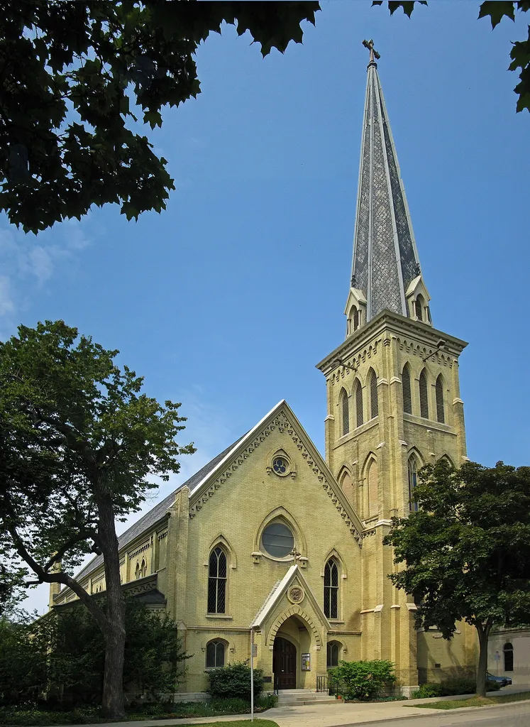 The Cathedral Church of All Saints (1867) at 804-828 E. Juneau Avenue in Milwaukee, Wisconsin, was designed by E. Townsend Mix in the English Gothic revival style. It is constructed of Cream City brick and limestone. It was originally built as the Olivet Congregational Church, but the building was sold to the Episcopal diocese in 1871 when the Olivet congregation faced bankruptcy. In 1898, it was consecrated as the first Episcopal cathedral in the United States. It was added to the National Register of Historic Places in 1974.