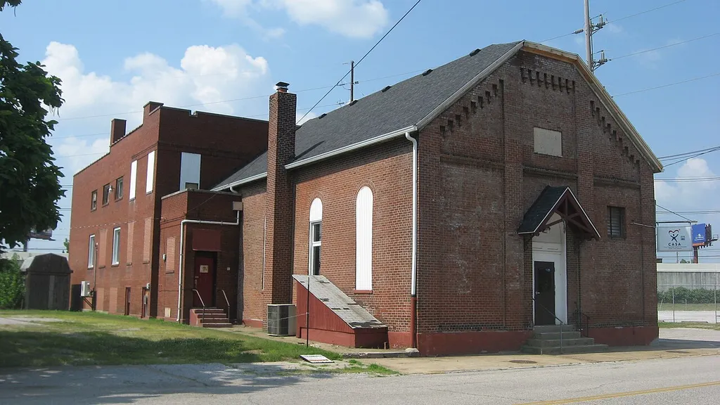 Front and southwestern side of Salem's Baptist Church, located at 728 Court Street in Evansville, Indiana, United States. Built in 1873, it is listed on the National Register of Historic Places.