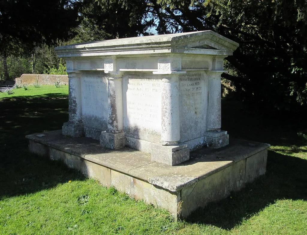 St Peter and St Paul's Church, Church Street, Godalming, Borough of Waverley, Surrey, England. This view shows a large tomb in the churchyard, commemorating members of the Holland family.