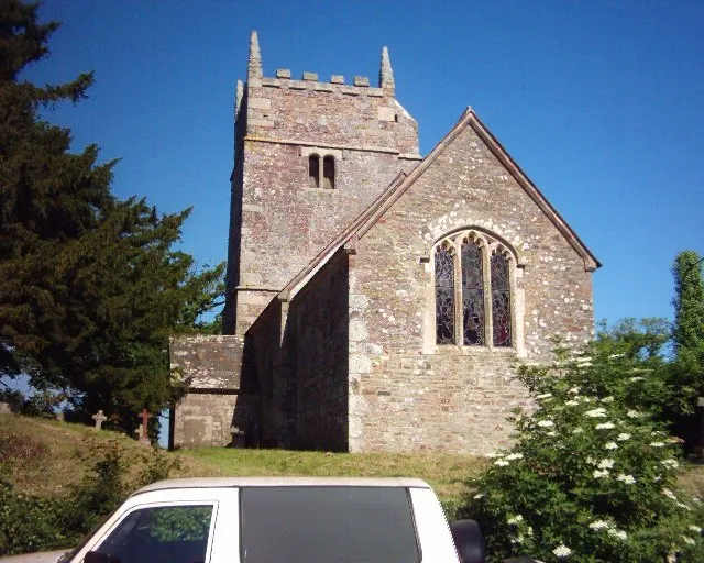 Clannaborough Church. Medieval church (still lit by candles) in a circular churchyard a short way from the main road (Crediton to Okehampton)