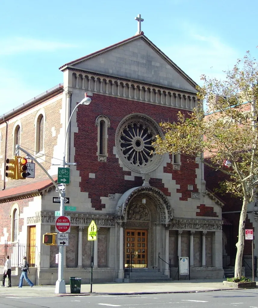 Church of the Guardian Angel (Roman Cathoic) on Tenth Avenue at 21st Street in the Chelsea neighborhood of Manhattan, New York City, was constructed in 1930 of limestone and brick, to a Italian Romanesque style design by John Van Pelt. {source: AIA Guide to NYC 4th ed.)
