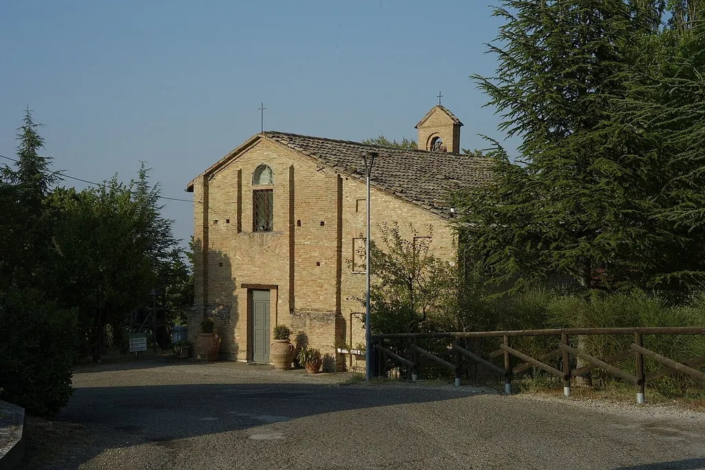 Main front of the parish church of Santa Maria Assunta di Valdazzo, in Gadana, a village of Urbino.