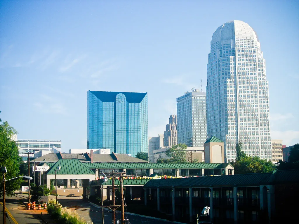 Skyline of downtown Winston-Salem with the redeveloped Bailey Power Plant in the foreground and 100 North Main Street, Winston Tower, the Reynolds Building, and the Reynolds American building in the background