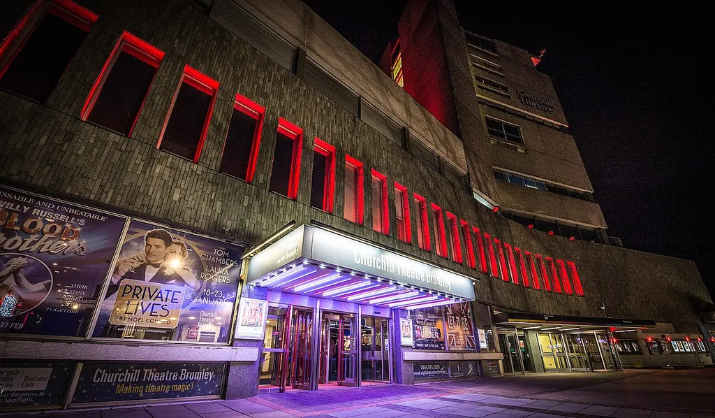 Outside the main box office entrance to the Churchill Theatre in Bromley, Kent taken at night.