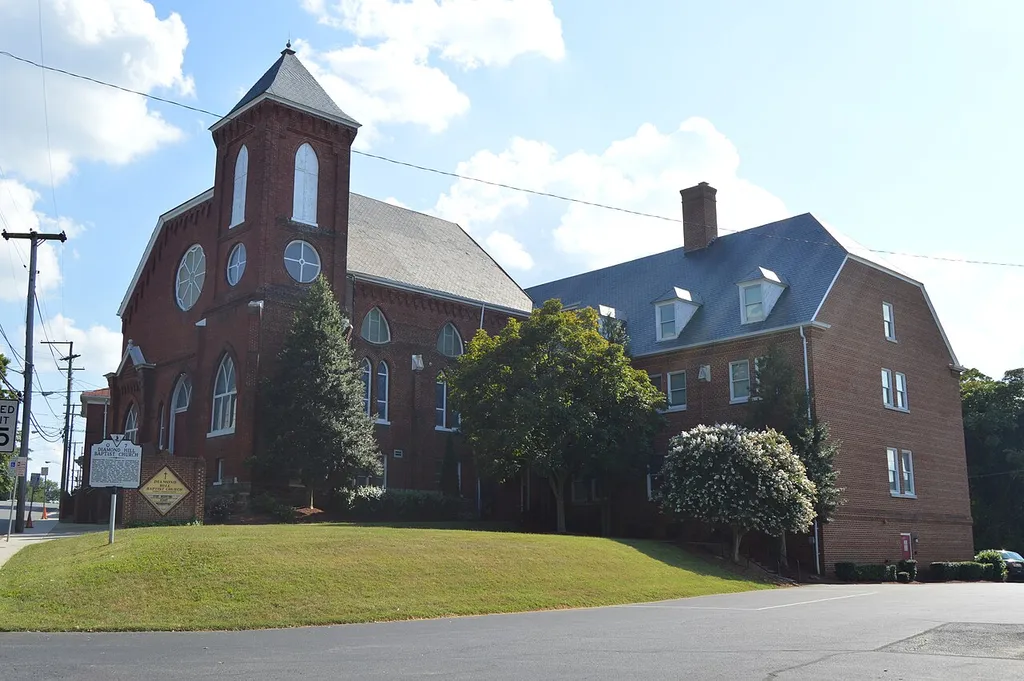 Front and northern side of the Diamond Hill Baptist Church, located at 1415 Grace Street in Lynchburg, Virginia, United States. Built in 1937, it is listed on the National Register of Historic Places, and it is part of a Register-listed historic district, the Diamond Hill Historic District.