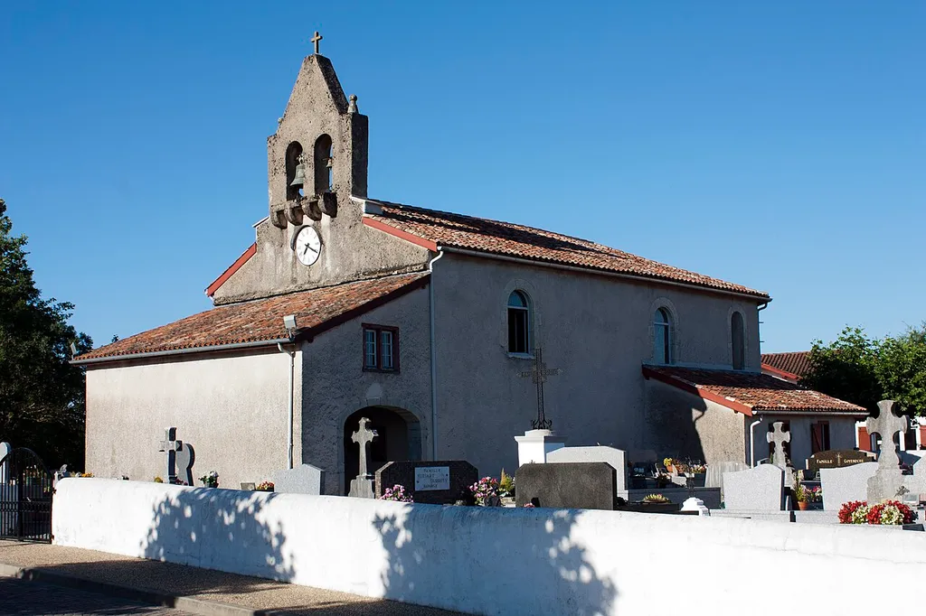 In the middle of his cemetery, the parish church of Elizaberri.