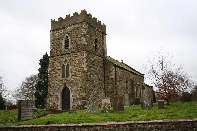 St. Andrew's church, Donington on Bain, Lincs. St. Andrew's has a Norman tower and font with later medieval gothic additions. There's also an early 17th century brass to a former rector "... the learned, prudent, pious Thomas Kent ..."