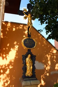 Wayside cross in front of the church