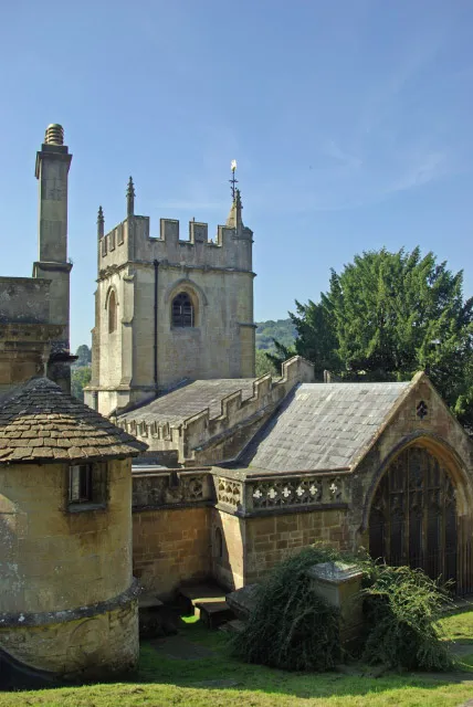 Parish church of St Thomas à Becket, Widcombe, Somerset, seen from the east, with the Garden House partly visible on the left
