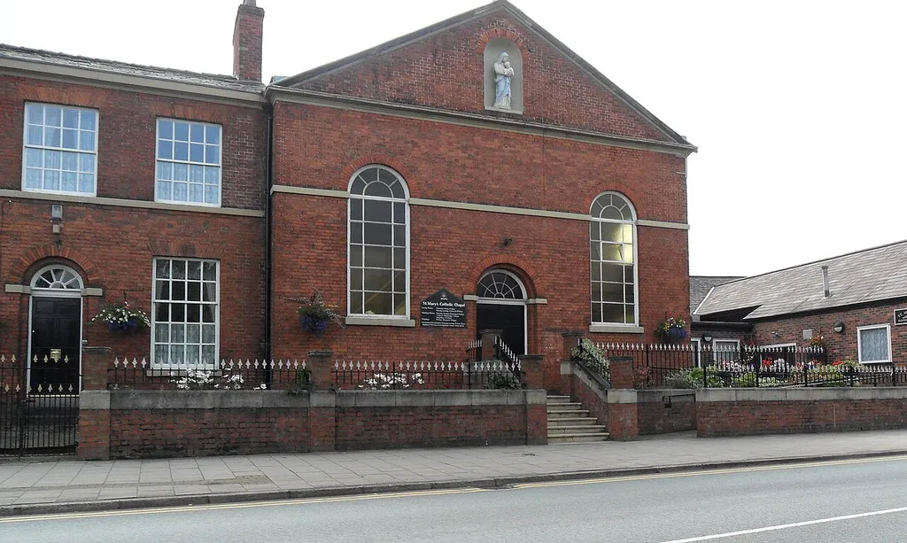 Roman Catholic church of St Mary (centre) and presbytery (left), West Road, Congleton, Cheshire, seen from the north