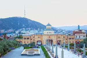 Gatehouse of Sameba Cathedral, Tbilisi with Church of the Theotokos of Iveron