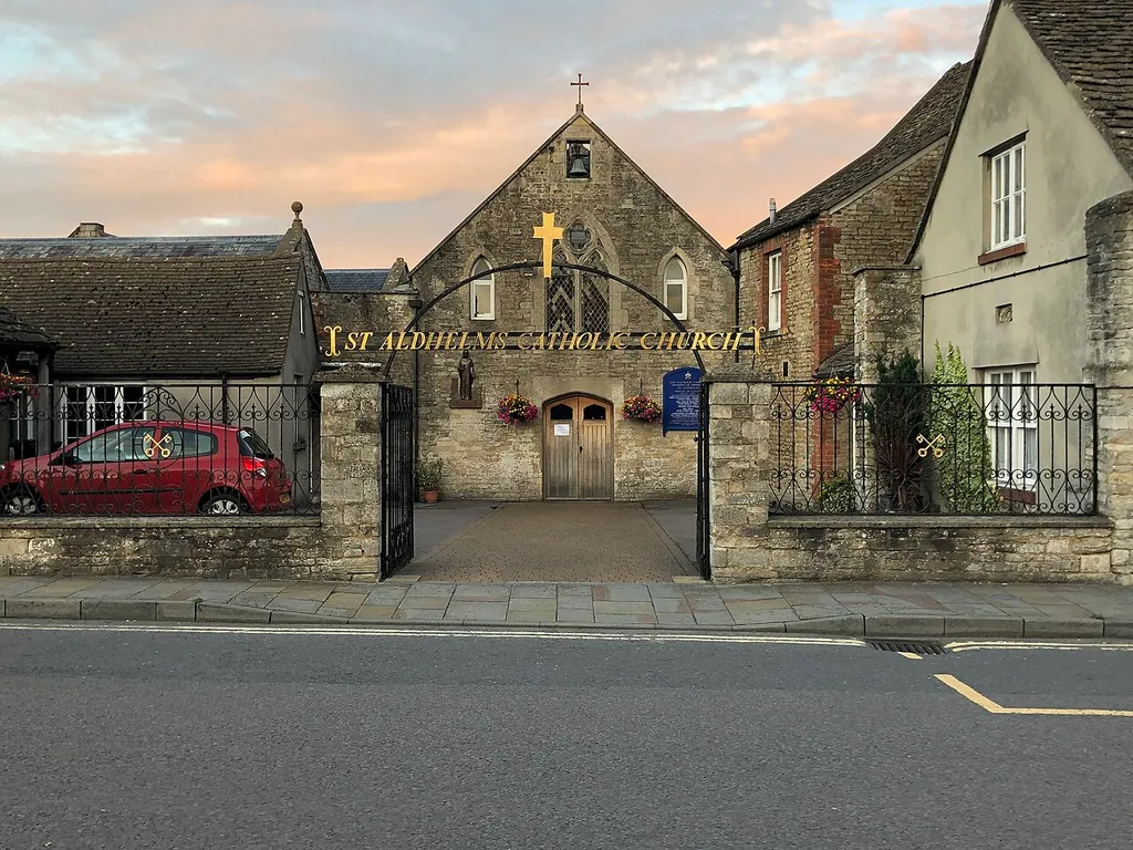 A frontal image of St Aldhelm's Roman Catholic Church in Malmesbury, Wiltshire, UK