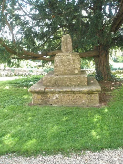 Base and broken shaft of 14th- or 15th-century stone cross in the parish churchyard of SS Peter and Paul, Steeple Aston, Oxfordshire