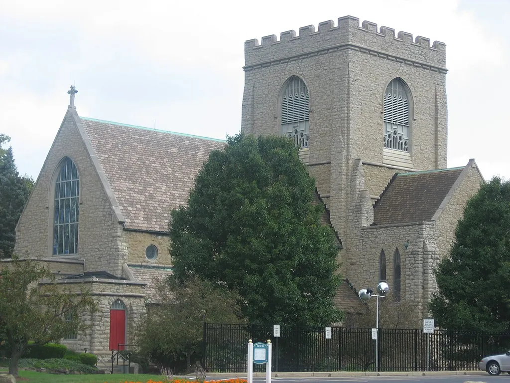 Front and southern side of St. John's Episcopal Church, located at 323 Wick Avenue in Youngstown, Ohio, United States. Built in 1898, it is listed on the National Register of Historic Places.