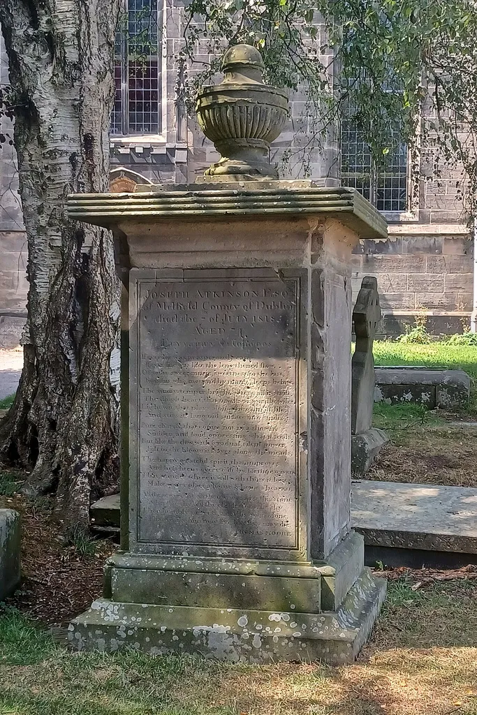 Atkinson Memorial approximately 20 metres south east of Church of St Giles: Grade II listed pedestal tomb in Cheadle, Staffordshired. .mw-parser-output .messagebox{margin:4px 0;width:auto;border-collapse:collapse;border:2px solid var(--border-color-progressive,#6485d1);background-color:var(--background-color-neutral-subtle,#fbfcff);color:var(--color-base,#202122);box-sizing:border-box;border-inline-start-width:8px}.mw-parser-output .messagebox.mbox-small{font-size:88%;line-height:1.25em}.mw-parser-output .mbox-warning,.mw-parser-output .mbox-speedy{border:2px solid var(--border-color-error,#b22222);background:var(--background-color-error-subtle,#ffdbdb);border-inline-start-width:8px}.mw-parser-output .mbox-serious,.mw-parser-output .mbox-delete,.mw-parser-output .mbox-stop{border:2px solid var(--border-color-error,#b22222);border-inline-start-width:8px}.mw-parser-output .mbox-issue,.mw-parser-output .mbox-content{border:2px solid #f28500;background:var(--background-color-warning-subtle,#ffe);border-inline-start-width:8px}.mw-parser-output .mbox-query,.mw-parser-output .mbox-style{border:2px solid #f4c430;background:var(--background-color-warning-subtle,#ffe);border-inline-start-width:8px}.mw-parser-output .mbox-shit{border:2px solid #960;border-inline-start-width:8px}.mw-parser-output .mbox-license{border:2px solid #88a;border-inline-start-width:initial}.mw-parser-output .mbox-legal{border:2px solid var(--border-color-notice,#666);background:var(--background-color-base,#fff);border-inline-start-width:8px}.mw-parser-output .mbox-honor{border:2px solid #ca3;background:var(--background-color-warning-subtle,#fcf4db);border-inline-start-width:8px}.mw-parser-output .mbox-growth{border:2px solid #8d4;background:var(--background-color-success-subtle,#d5fdf4);border-inline-start-width:8px}.mw-parser-output .mbox-move{border:2px solid #93c;border-inline-start-width:8px}.mw-parser-output .mbox-protection,.mw-parser-output .mbox-message{border:2px solid var(--border-color-base,