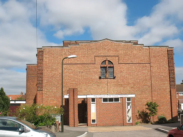 St Olave's church, Mitcham: south side The church was built in 1930-1 to the designs of Arthur Campbell Martin and took its dedication from the recently demolished church of St. Olave's, Tooley Street 1135619. It was never completed as intended. (source: http://www.southwark.anglican.org/parishes/171j ) This is the main (south) entrance facing Church Walk.