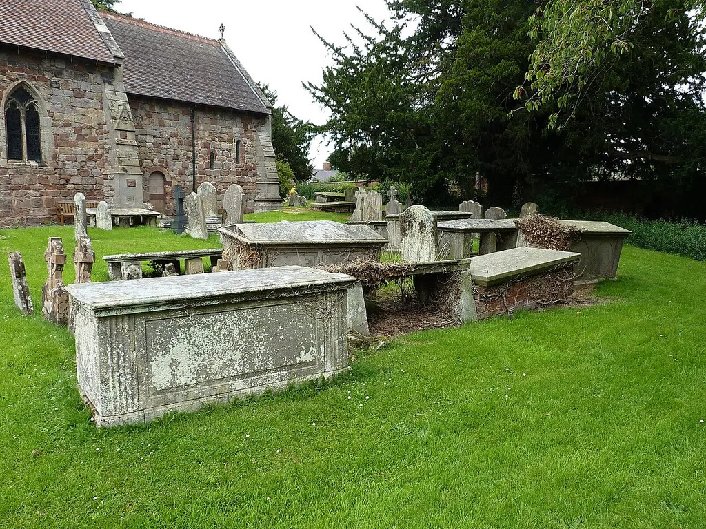Group of chest tombs in the churchyard of St Lucia at Upton Magna