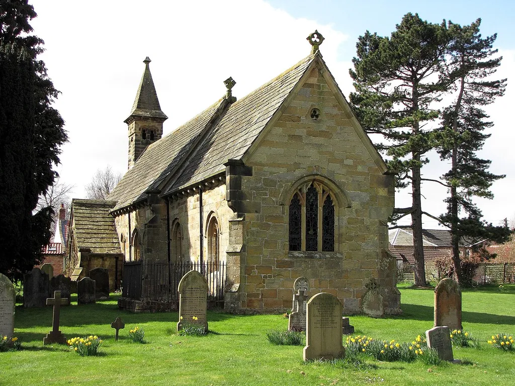 St Leonard's Church, Thornton-le-Street Described in 1890 as "a small neat structure, consisting of nave, chancel, porch, and small belfry with two bells, on the west gable. There are indications in the architecture of the oldest portions that point to the twelfth century as the period of erection. In 1855, the edifice was restored in the Early English style, when the Norman chancel arch was replaced by a pointed one".