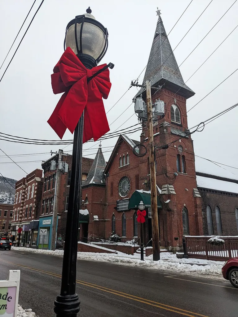 The Hotel Pharmacy at 20 Elliot Street in downtown Brattleboro, Vermont. Formerly a Methodist church, the pharmacy was closed in January 2023 and purchased by Walgreens.
