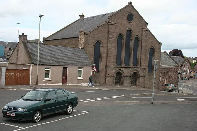 St James Church This former Church of Scotland is now disused. I see that it has recently been boarded up - last time I looked the windows had all been broken by vandals.