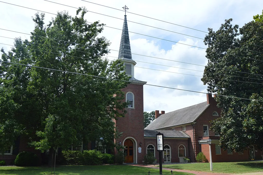 Front of Grace Episcopal Church, located at 303 S. Main Street (State Route 3) in Kilmarnock, Virginia, United States. Built in 1959 to replace an 1852 church (now a rear chapel), it is listed on the National Register of Historic Places.