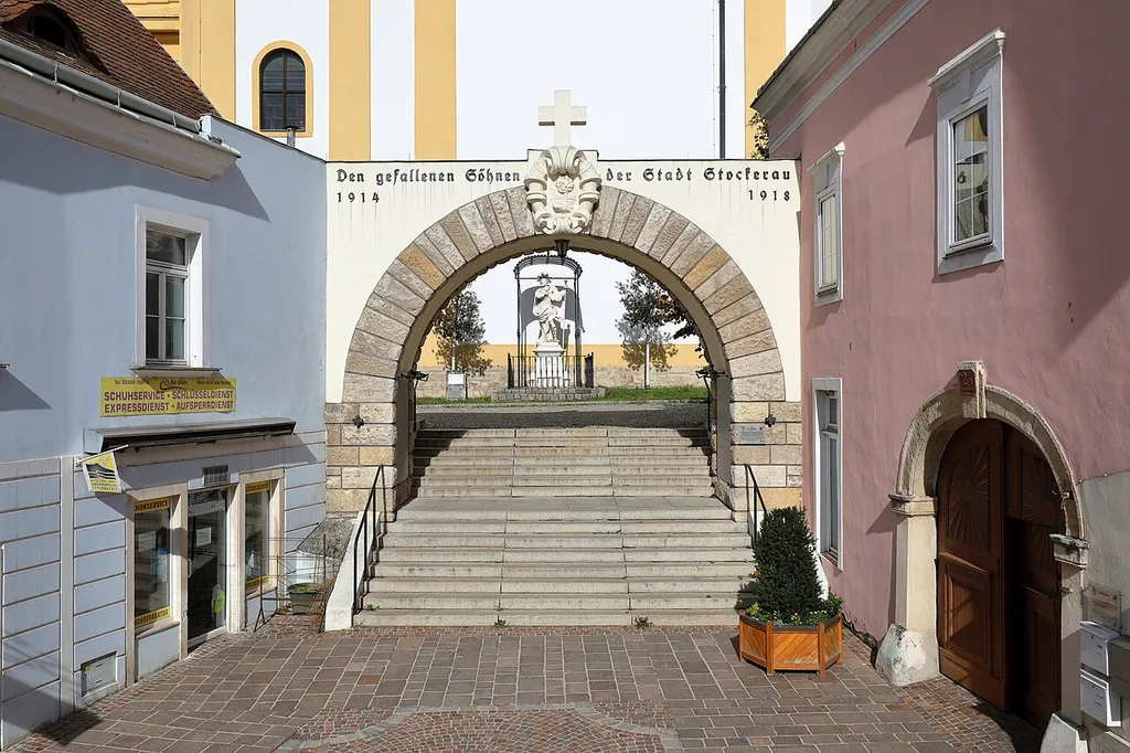 Stairs to the church with war memorial in Stockerau.