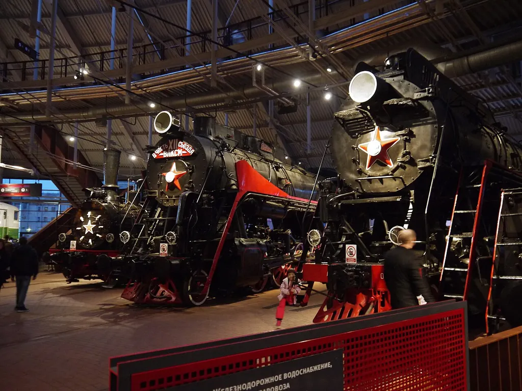 Russian Railway Museum, adjacent Baltiysky Railway station, Saint Petersburg Left Ov6640 Nineteenth Century Freight locomotive. During 2017 she was restored to working order. 8000 of these were built up until the Russian Revolution This one was built at the Putilov works in St. Petersburg in 1902. During World War II it was used as part of an armoured train. Centre L2298 - 4199 examples built 1945-55. This example was built in honour of the 12th Congress of Young Communist organisation in 1954. Right LV18-002 Weight in working order: without tender 12 tons including tender 130 tonnes Deaign speed 80 km / h. maximum power at the rim of the wheel 2600 PS Built in the Voroshilovgradskim Parovozostroitelnym factory. The October Revolution of 1953. It served at Moskovsko-Ryazanskoy and Northern Iron roads until 1982. It then went to Ispolzovalsya as boiler enterprise "Komiavtostroy."