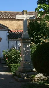 Stone cross next to the Church of Saint Andrew