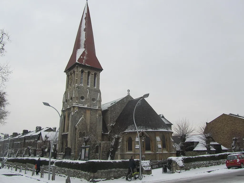 Parish church of St John the Evangelist, East Dulwich, London, seen from the east in snow