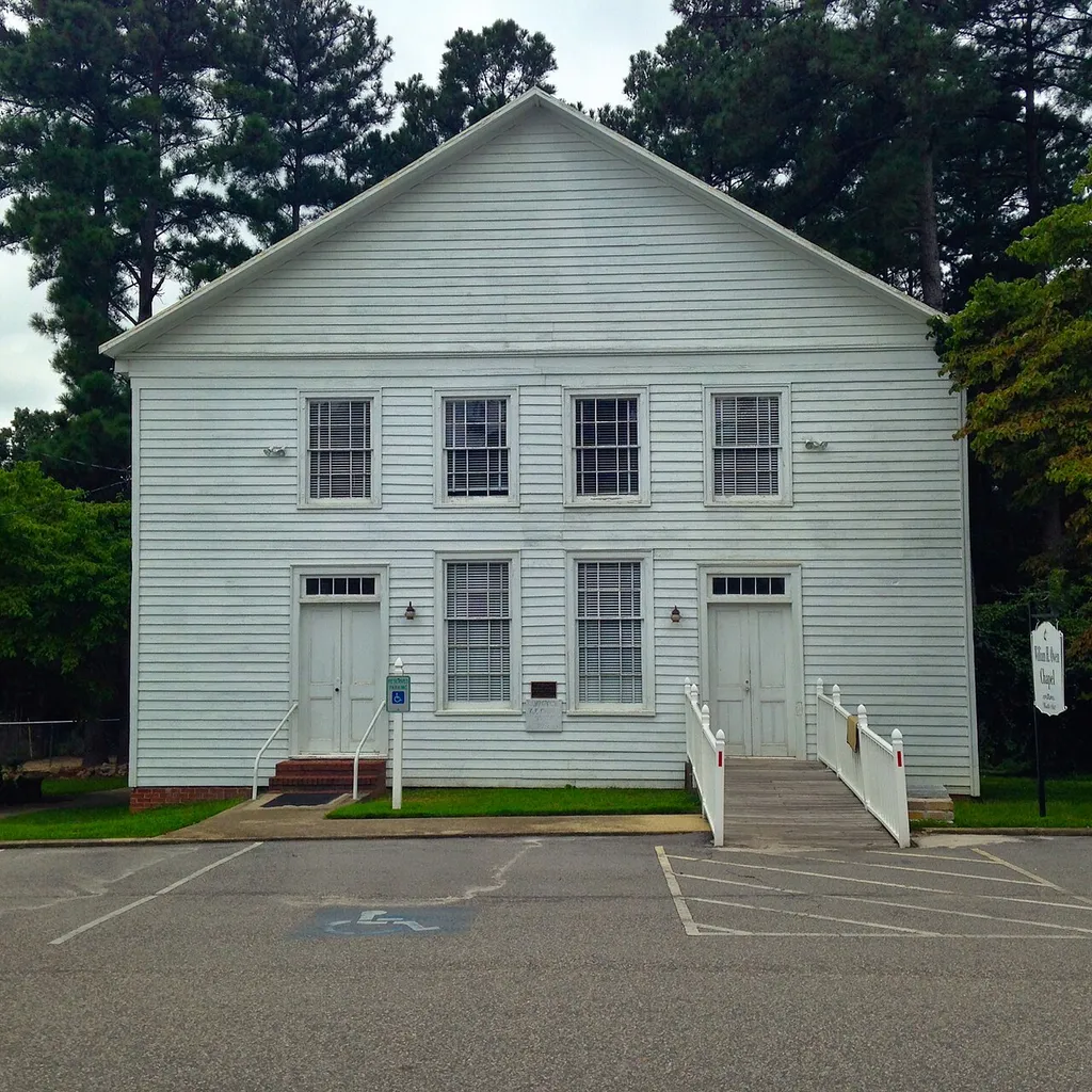 This is the William H. Owen Chapel, which was formerly called Camp Ground United Methodist Church. It was built in 1861 on a site where church services had been held since the 1840's. A much larger church was built to replace it in 1961 and is located in front of it the original church pictured here. The larger church built in 1961 continues to use the name Camp Ground United Methodist Church and is where normal church services are regularly held. The Owen Chapel is still used for some special occasions.