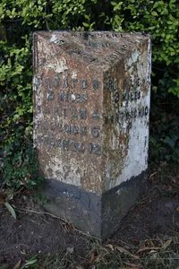 Milepost, opp. Bickerton Church, on cross roads