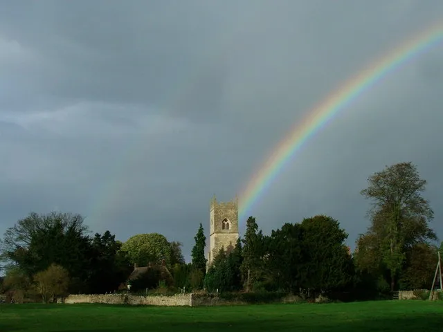 A double rainbow behind the tower of St Mary and St Edburga's parish church, Stratton Audley, Oxfordshire
