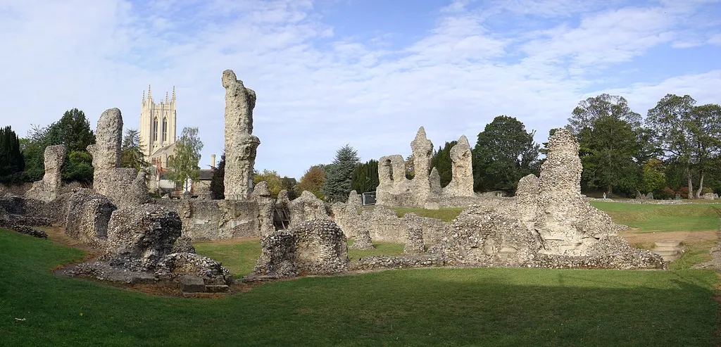 Composite panorama photograph of the remains of Bury St Edmunds Abbey, Suffolk, England, with the tower of St James' Cathedral in the background