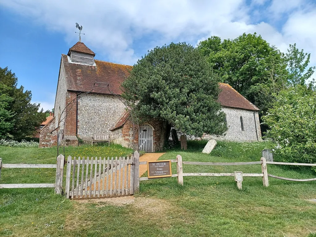 St. Peter's Church, East Marden, West Sussex, England. 12th-century nave and font, 13th-century chancel, 18th-century porch. Grade I listed.