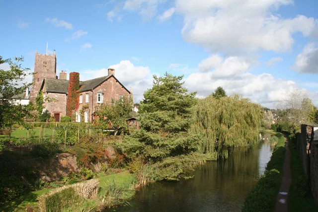 Sampford Peverell: Grand Western Canal and church The canal cuts right through the village. Sampford Peverell church is dedicated to St John the Baptist. The house in front of the church is the old vicarage