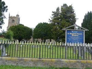 Railings, gates and gatepiers to churchyard of St Margaret