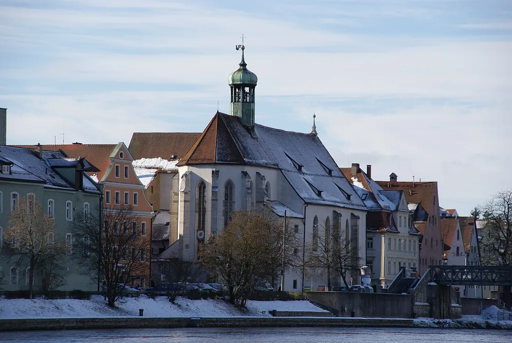St. Oswald Church, Regensburg, Germany, built in the early 14th century, turned to baroque style in 1708. The church is situated at the river bank of the Danube.
