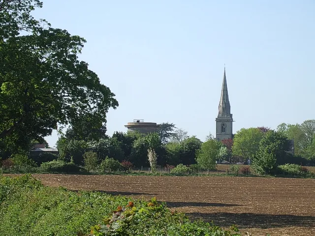 Water Tower and Church, Ridgmont. Taken from the lane from Ridgmont to Eversholt (unsurprisingly called Eversholt Road). The subject grid reference I've given is for the Water Tower at SP97633592. The spire belongs to 326623 which is in the adjacent gridsquare at SP97593605