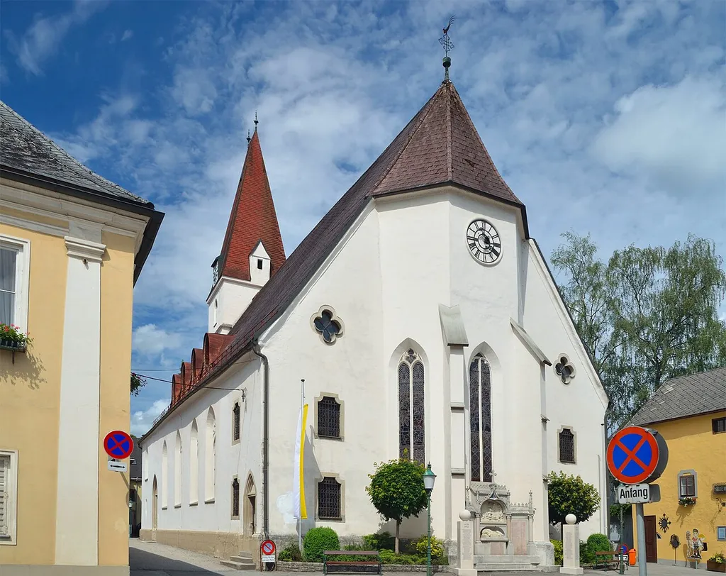 The parish church St. Nicholas in Gresten, Lower Austria, is protected as a cultural heritage monument as well as a cultural property after the Hague Convention. To the left the rectory, to the right the former ossuary, now museum.