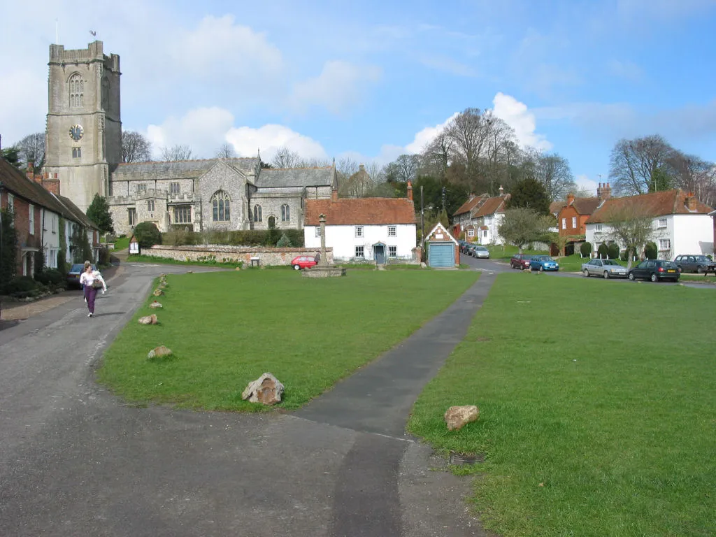 View north across the Green, Aldbourne, Wiltshire, to St Michael's parish church